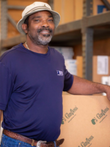 Darrin, Goodwill Business Services, man in blue shirt, tan bucket hat