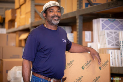 Darrin, Goodwill Business Services, man in blue shirt, tan bucket hat