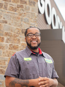 Goodwill San Antonio Business Services employee, male, glasses, grey shirt