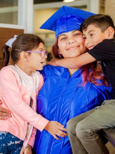 Good Careers Academy graduates and her 2 children