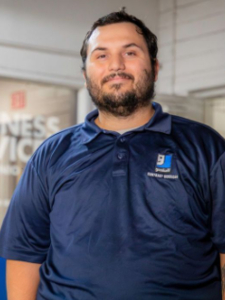 Goodwill San Antonio, male, blue polo shirt