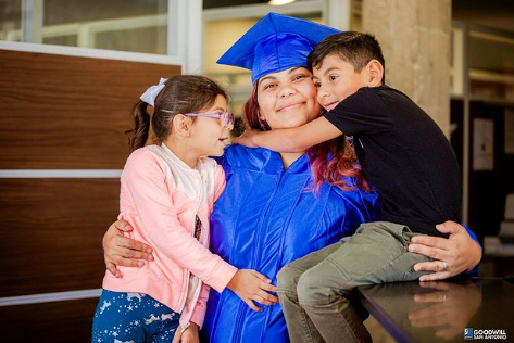 Good Careers Academy graduates and her 2 children