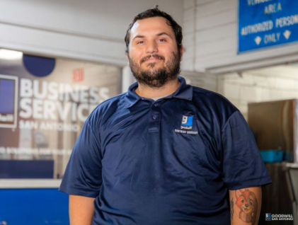 Goodwill San Antonio, male, blue polo shirt