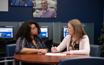 Good Careers Specialist assists with writing a resume
