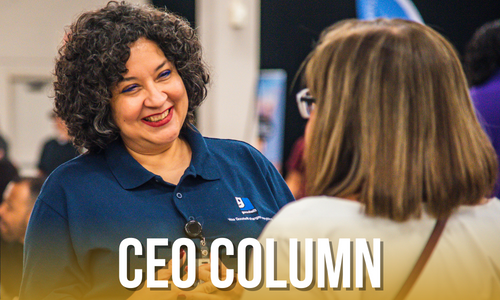 Photo of Goodwill San Antonio employee discussing career opportunities to job seeker.