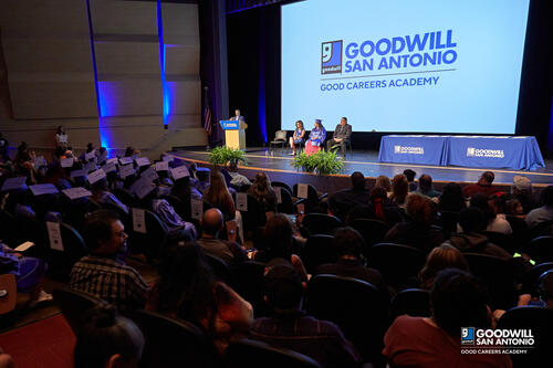 Goodwill San Antonio President and CEO Carlos Contreras speaks in front of the graduating class of the Goodwill San Antonio Good Careers Academy.