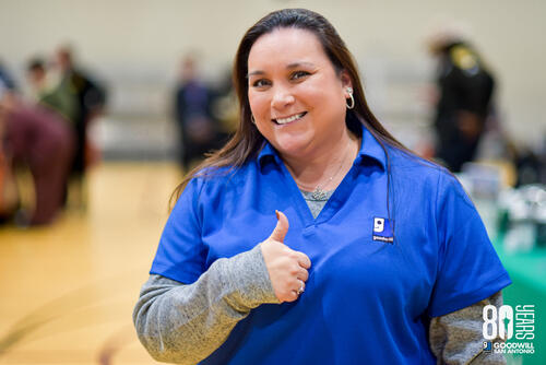 goodwill team member with thumbs up