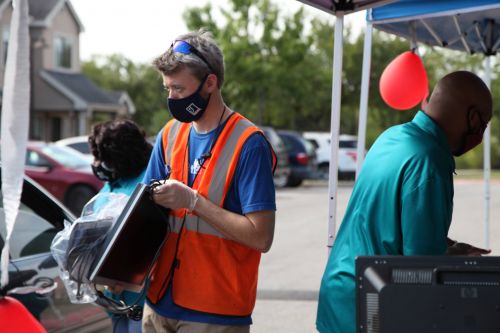 Goodwill San Antonio Partners with SAHA in Distributing Computers to Graduates